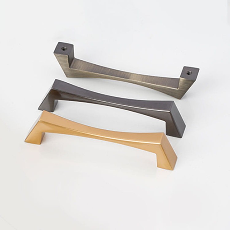 Uchwyt meblowy Peral – nowoczesny, elegancki uchwyt w kolorach: złoty szczotkowany, złoty, czarny, szary perłowy i nikiel szczotkowany, w rozmiarach 128–320 mm, idealny do mebli kuchennych, łazienkowych, szafek i szuflad.