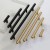 Zestaw czarnych matowych oraz błyszczących złotych uchwytów meblowych Poza
