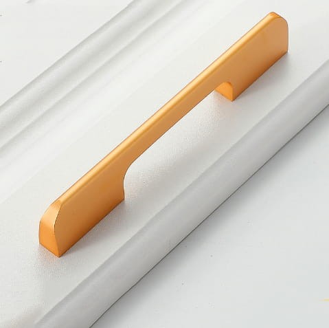 Złoty szampański uchwyt meblowy Largo z profilowaną rączką, rozstaw 128 mm do szafek