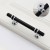 Czarny uchwyt meblowy Pina z chromowanymi wspornikami o rozstawie otworów 96 mm