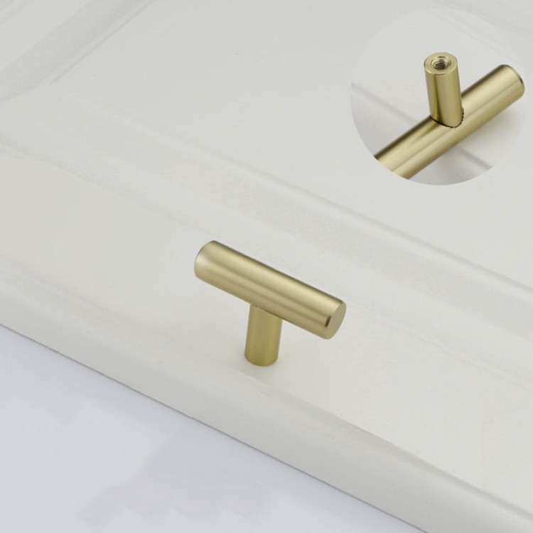 Möbelgriff Uno – T-Bar-Griff mit rundem Profil in Schwarz und gebürstetem Gold. Erhältlich als T-Bar-Knopf sowie in 96, 128, 160, 256, 512 und 850 mm – egriffe.at