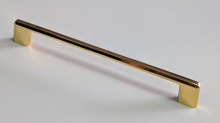 Elegancki złoty szczotkowany uchwyt meblowy Batuco, rozstaw 192 mm do szuflad i komód