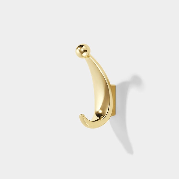 Wandhaken Celma – schlichtes, elegantes Design in moderner Ausführung. Solide verarbeitet, leicht zu montieren und vielseitig einsetzbar in Bad, Küche, Flur oder Büro. Farben: Gold, Schwarz und Perlgrau.