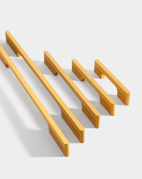 Möbelgriff Pomo – moderner länglicher Griff für Küchenmöbel, Schränke und Schubladen. Farben: Schwarz, Champagnergold und Grau. Größen: Knopf, 192, 320 und 800 mm.