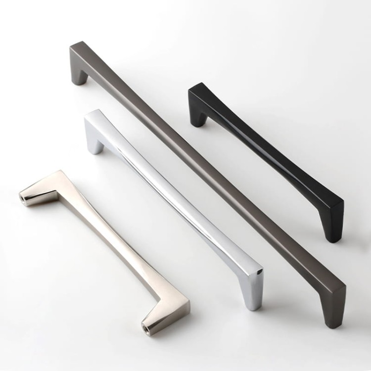 Uchwyt meblowy Mela – nowoczesny, klasyczny, minimalistyczny uchwyt w kolorach: czarnym, złotym szczotkowanym, nikiel szczotkowany, szary perłowy; rozmiary 128–256 mm, idealny do mebli kuchennych, łazienkowych, garderoby i komód.