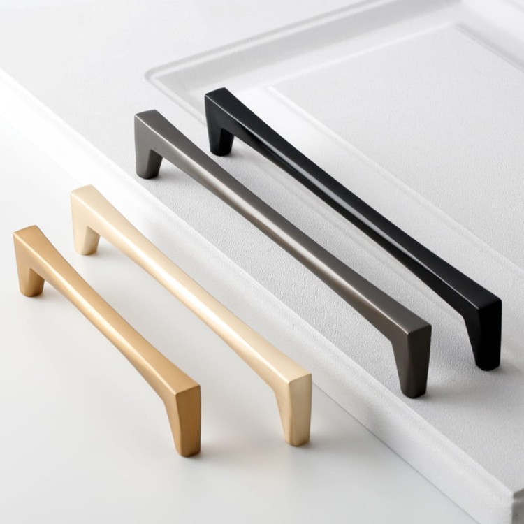 Uchwyt meblowy Mela – nowoczesny, klasyczny, minimalistyczny uchwyt w kolorach: czarnym, złotym szczotkowanym, nikiel szczotkowany, szary perłowy; rozmiary 128–256 mm, idealny do mebli kuchennych, łazienkowych, garderoby i komód.