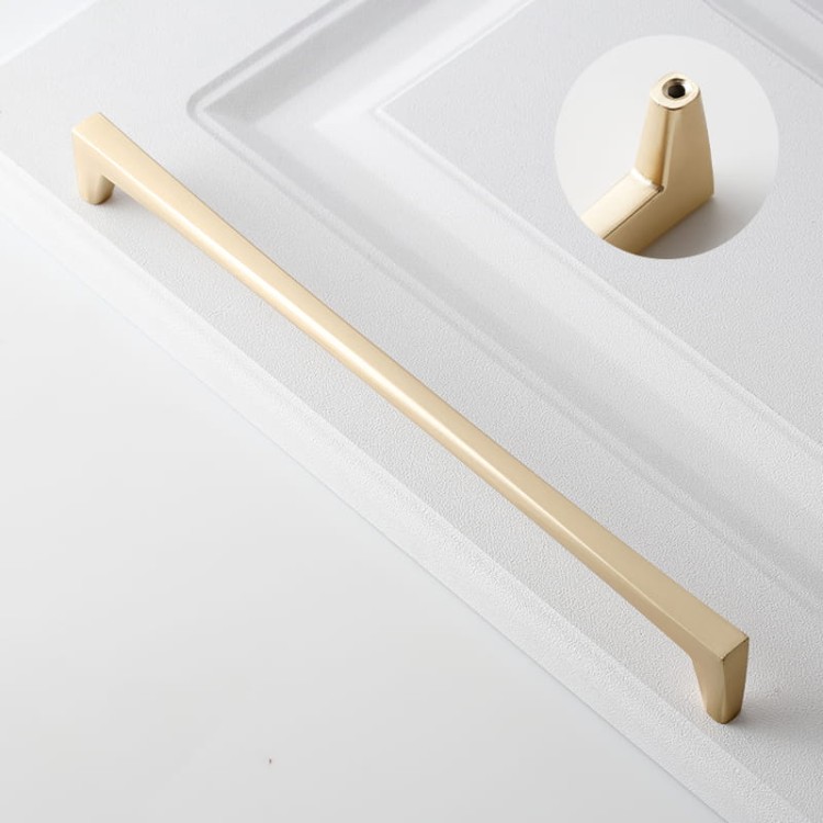 Uchwyt meblowy Mela – nowoczesny, klasyczny, minimalistyczny uchwyt w kolorach: czarnym, złotym szczotkowanym, nikiel szczotkowany, szary perłowy; rozmiary 128–256 mm, idealny do mebli kuchennych, łazienkowych, garderoby i komód.